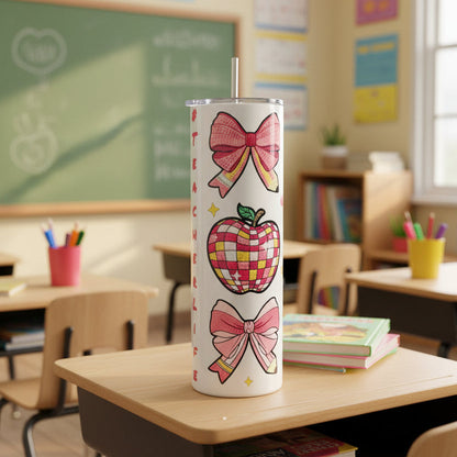Tumbler with a checkered apple and pink bows design on a white background.