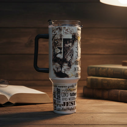 Tumbler with religious design and text on a countertop