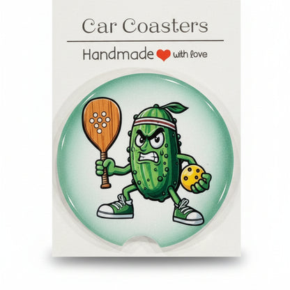 Car coaster with pickle character design on a wooden surface