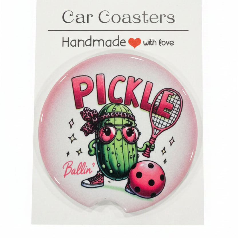 Car coaster with pickle design and 'Car Coasters' branding on a wooden surface