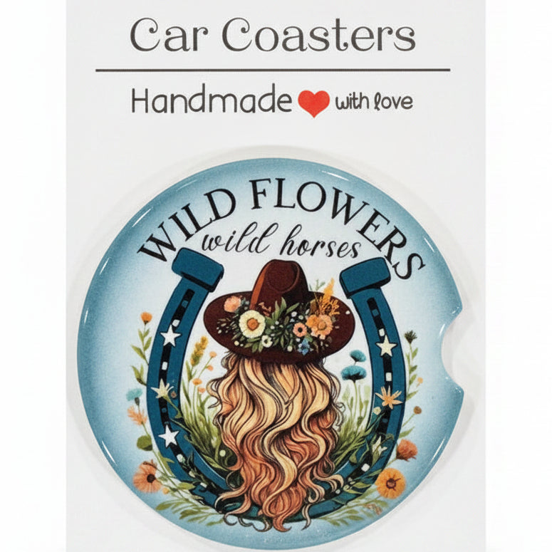 Decorative coaster with floral design and text on a white card, placed on a wooden surface.