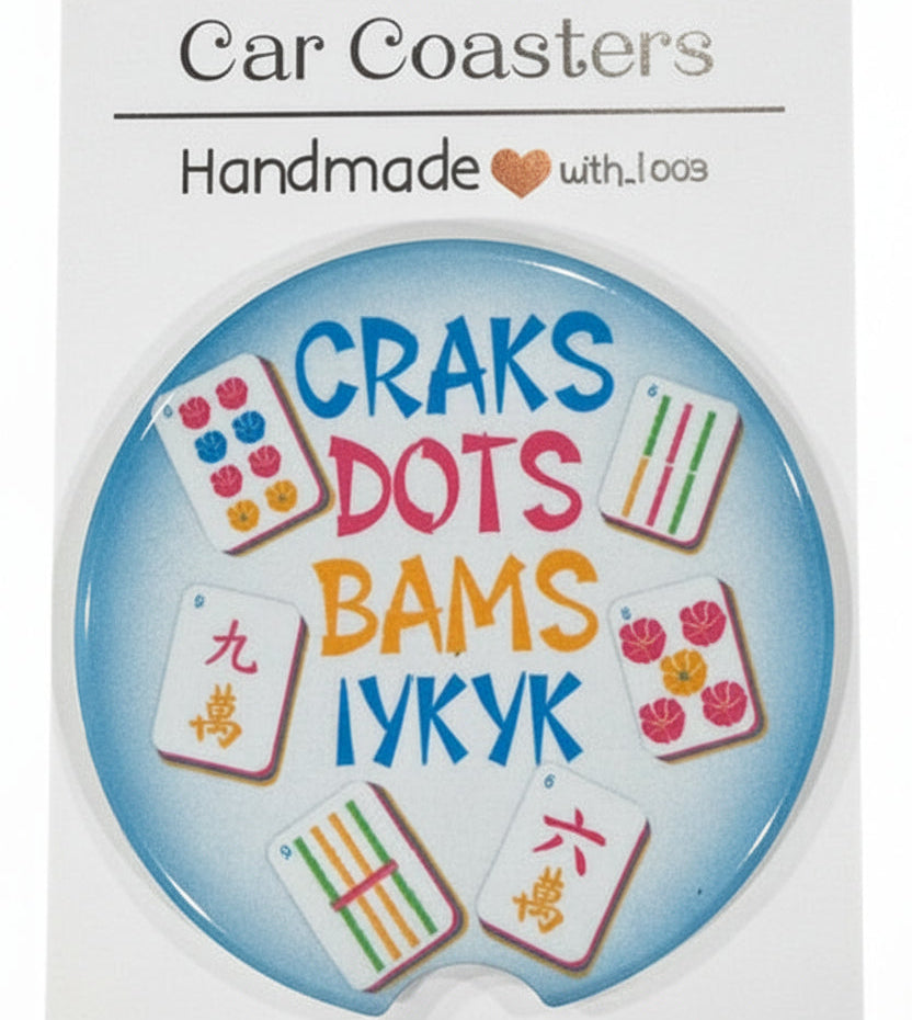 Car coaster with colorful text and designs on a white card, featuring the brand 'Car Coasters'.