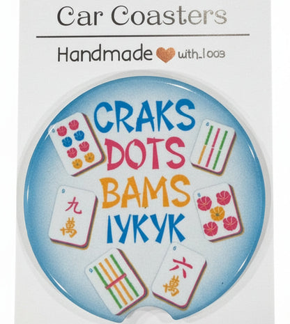 Car coaster with colorful text and designs on a white card, featuring the brand 'Car Coasters'.
