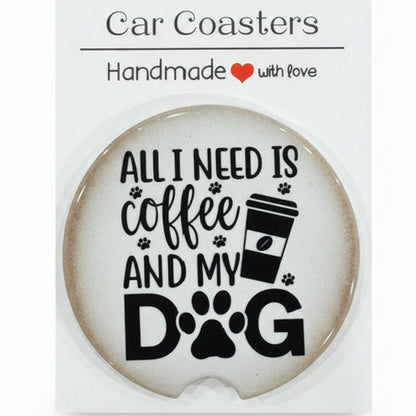 Car coaster with text 'All I need is coffee and my dog' on a wooden surface