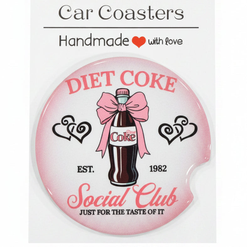 Car coaster with Diet Coke design on a wooden surface