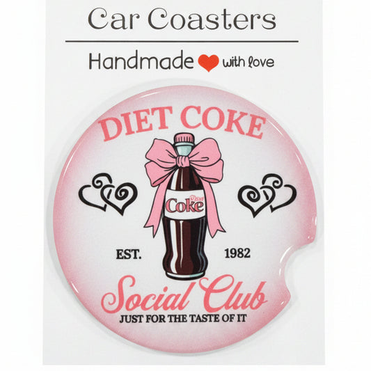 Car coaster with Diet Coke design on a wooden surface