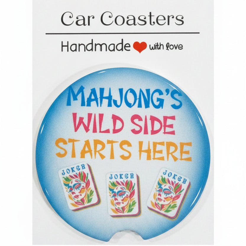 Car coaster with text and graphics on a wooden surface