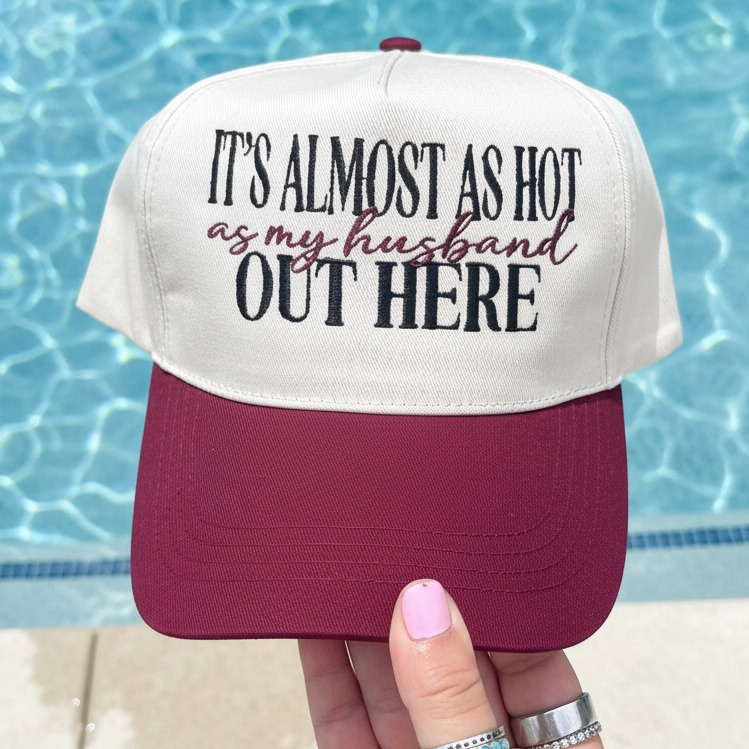 Hat It's almost as hot as my husband out here
