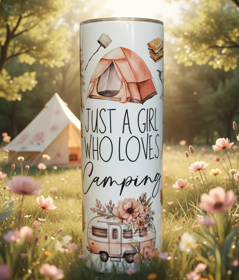 Tumbler with camping-themed design and text 'Just a Girl Who Loves Camping' on an outdoor background with flowers 