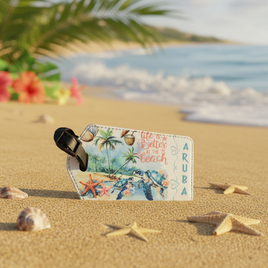 Luggage tag with beach-themed design featuring seashells, starfish, and floral elements on a white background.